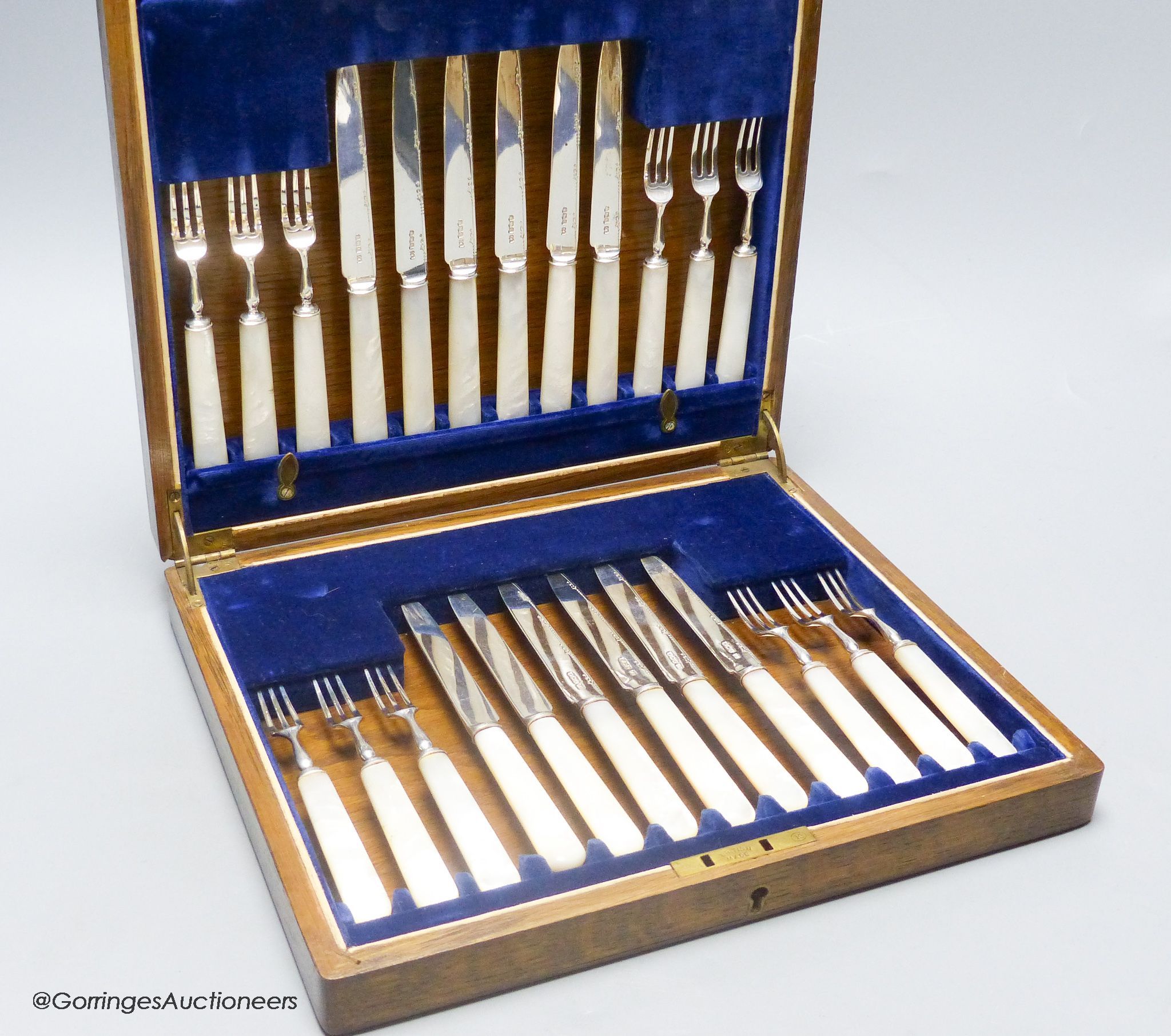 A cased set of George V mother of pearl handled silver dessert eaters, Frank Cobb & Co Ltd, Sheffield, 1927